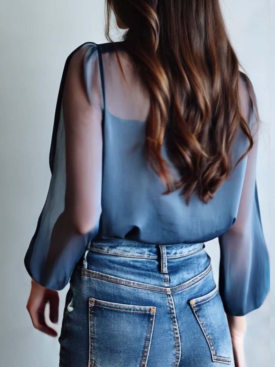 Camicetta da donna blu trasparente con stampa floreale e bottoni
